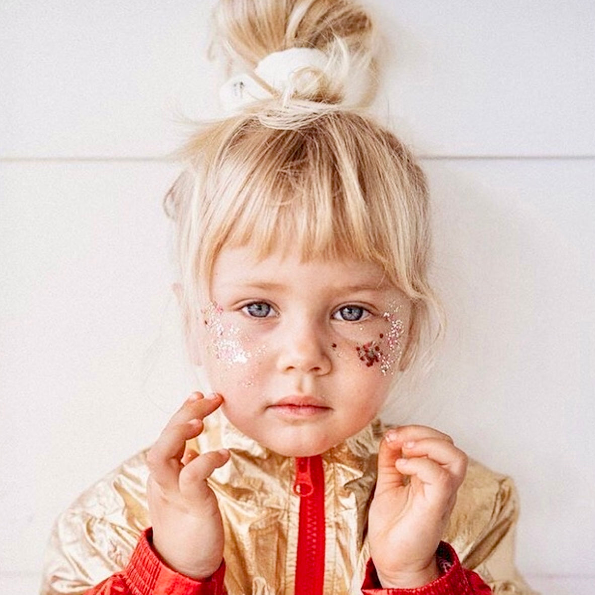 Cute girl with eco glitter makeup, it's kid friendly biodegradable bioglitter thats safe for children. Mixed in Australia bt The Glitter Tribe.