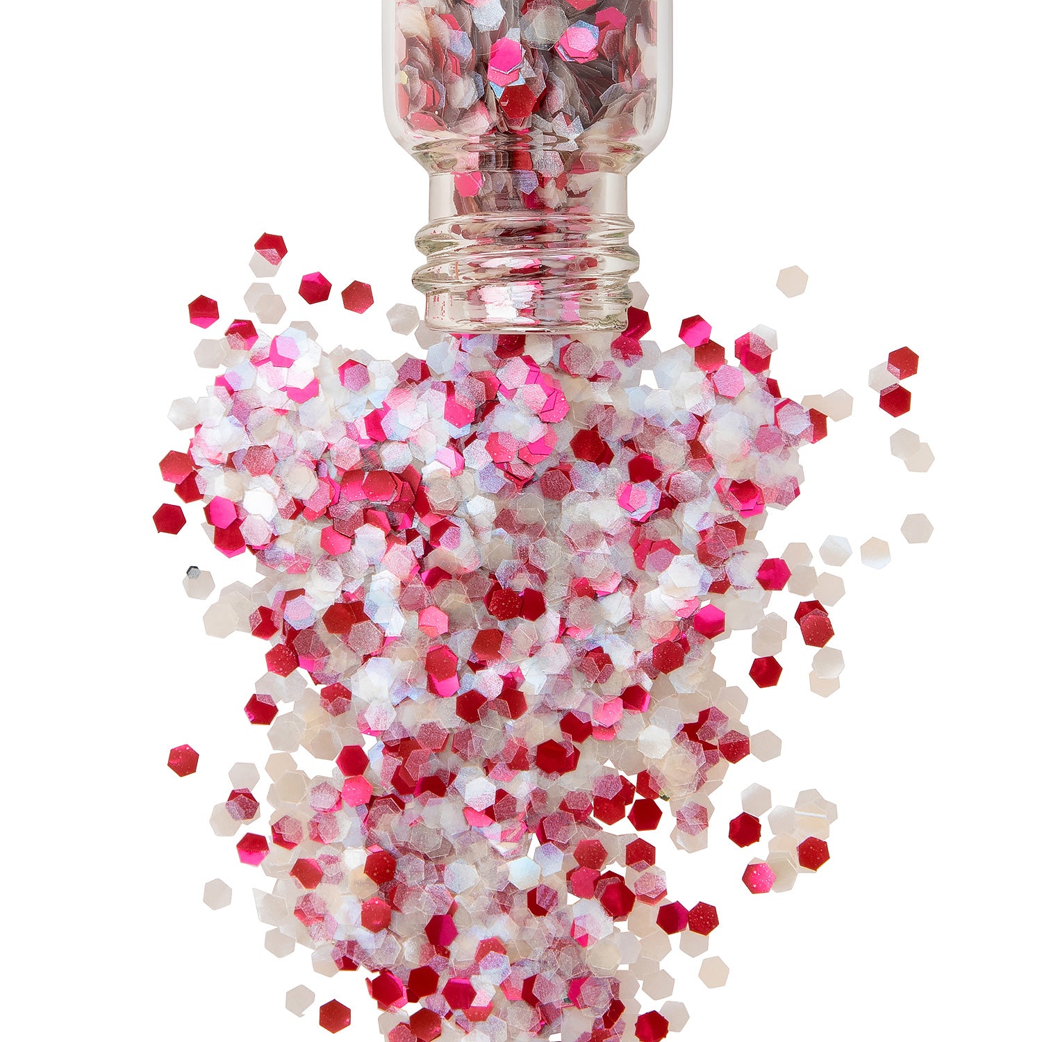Red and white chunky bio glitter that looks like candy cane in a jar glitter is spilling out onto a white background.