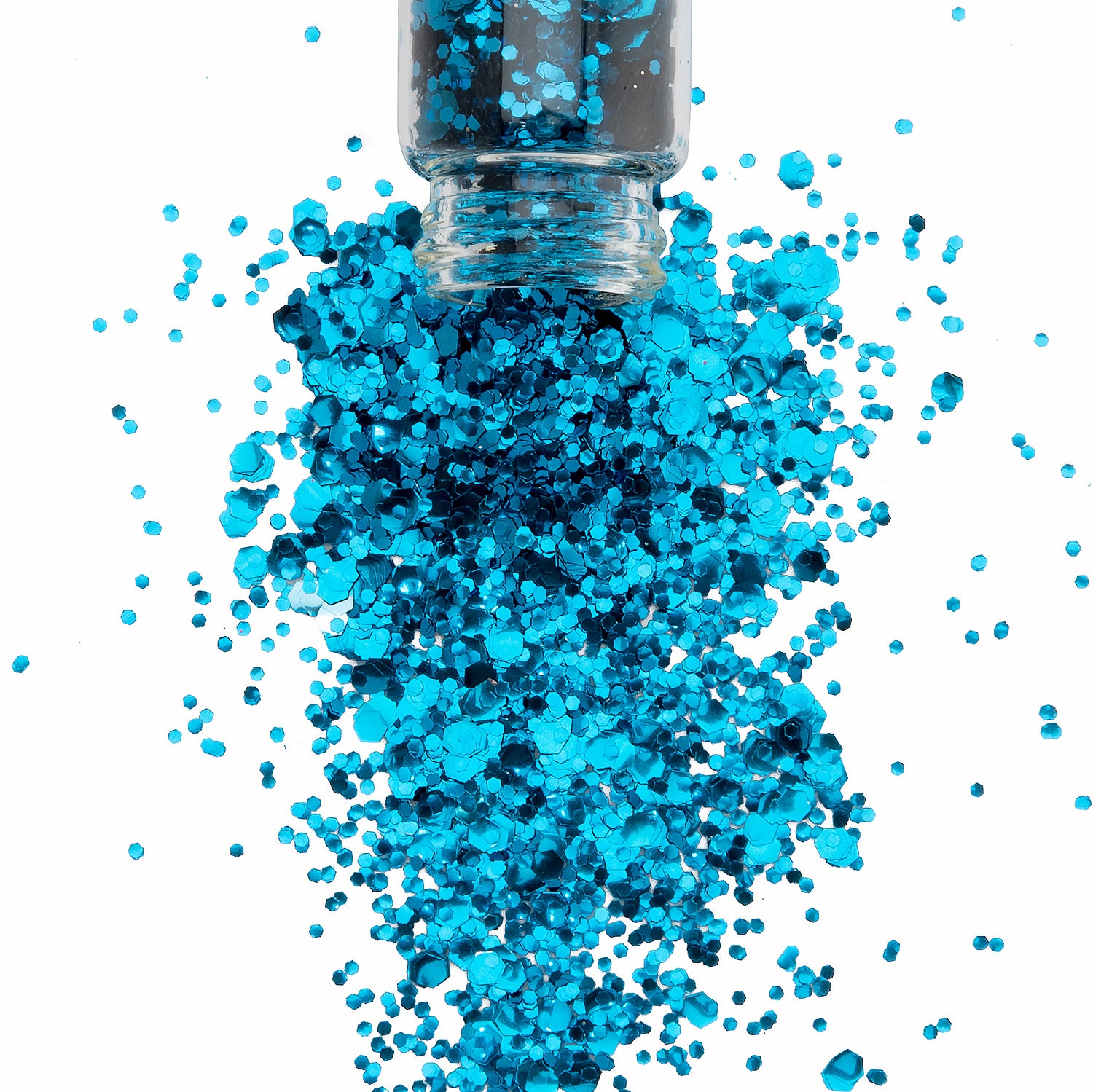 Bright blur bio glitter spilling out of a glass jar onto a white background.