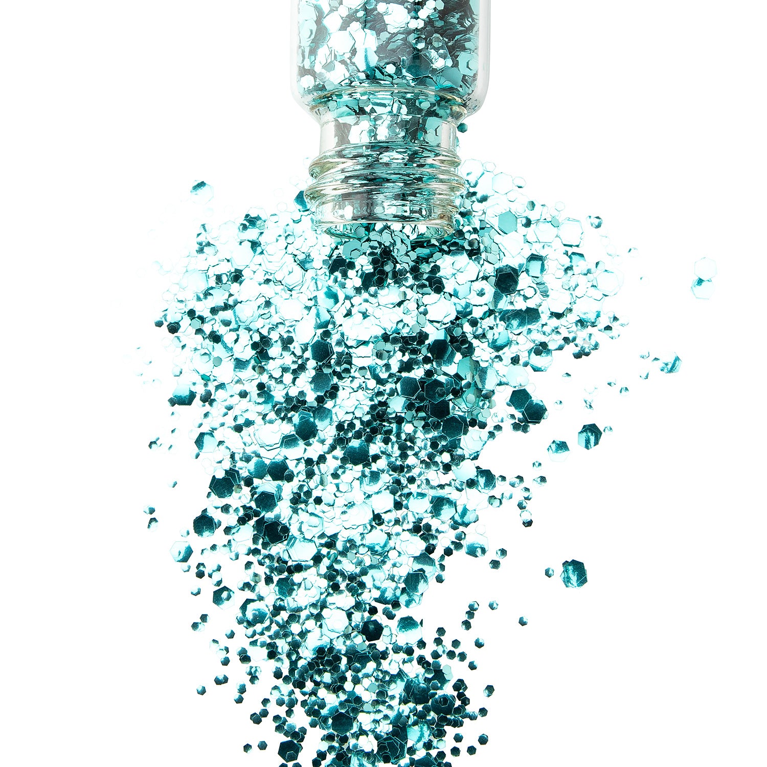 A jar of turquoise biodegradable glitter being spilled out, with glitter particles scattered around it against a white background.