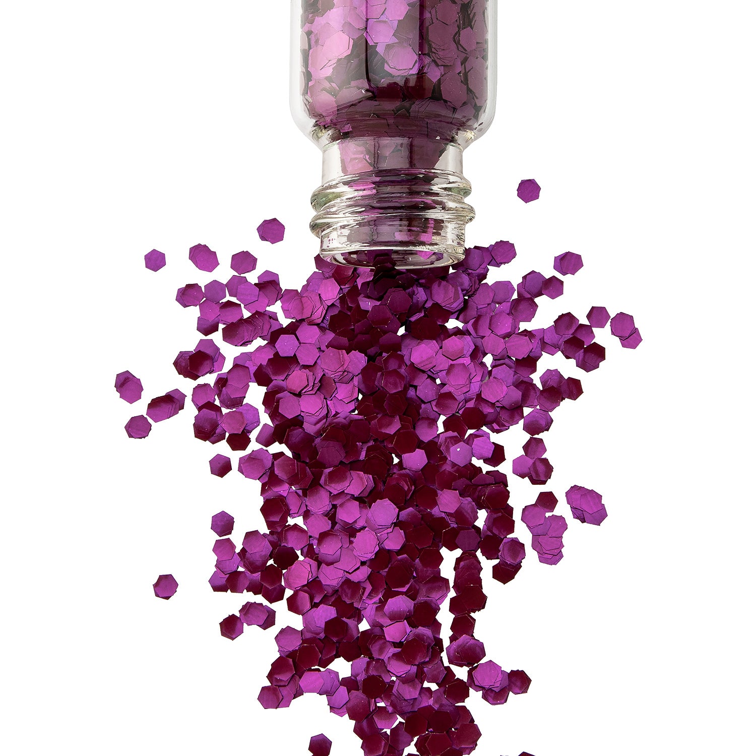 A jar of purple biodegradable glitter with the cap off, spilling out numerous purple glitter pieces.