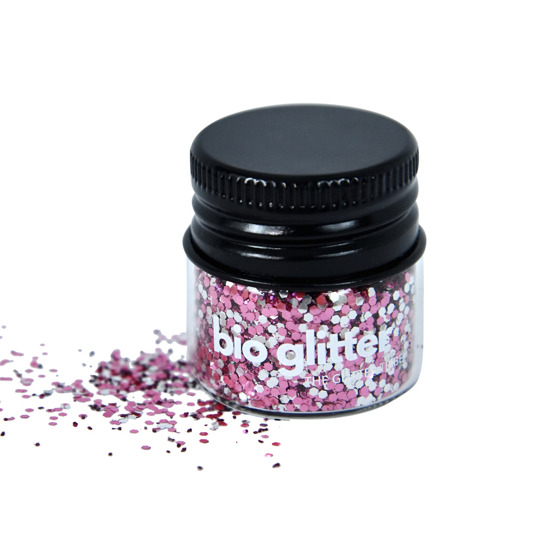 Raspberry Sorbet biodegradable glitter with silver sparkles spilling over