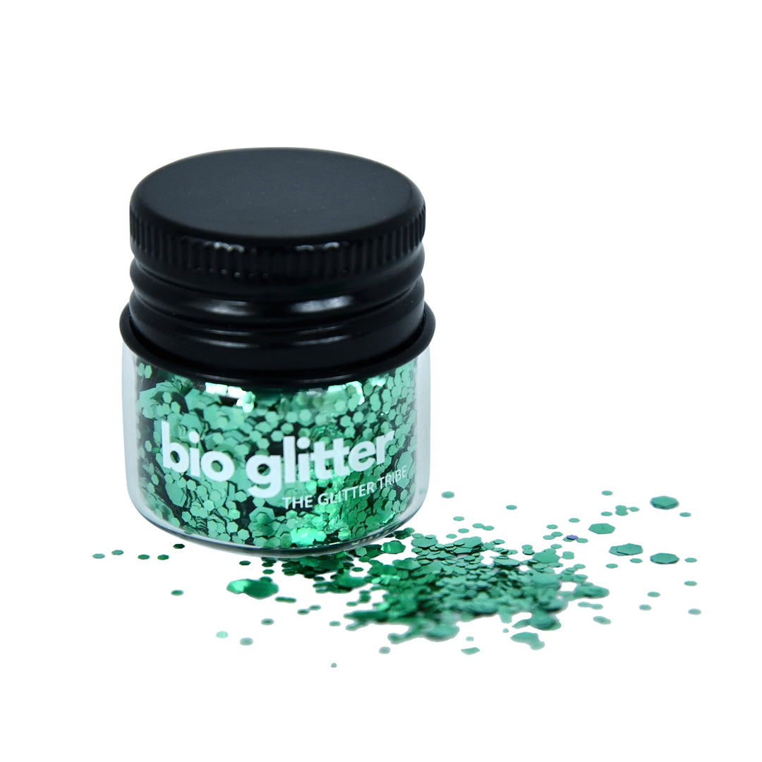 Green chunky glitter in a glass jar with a black lid