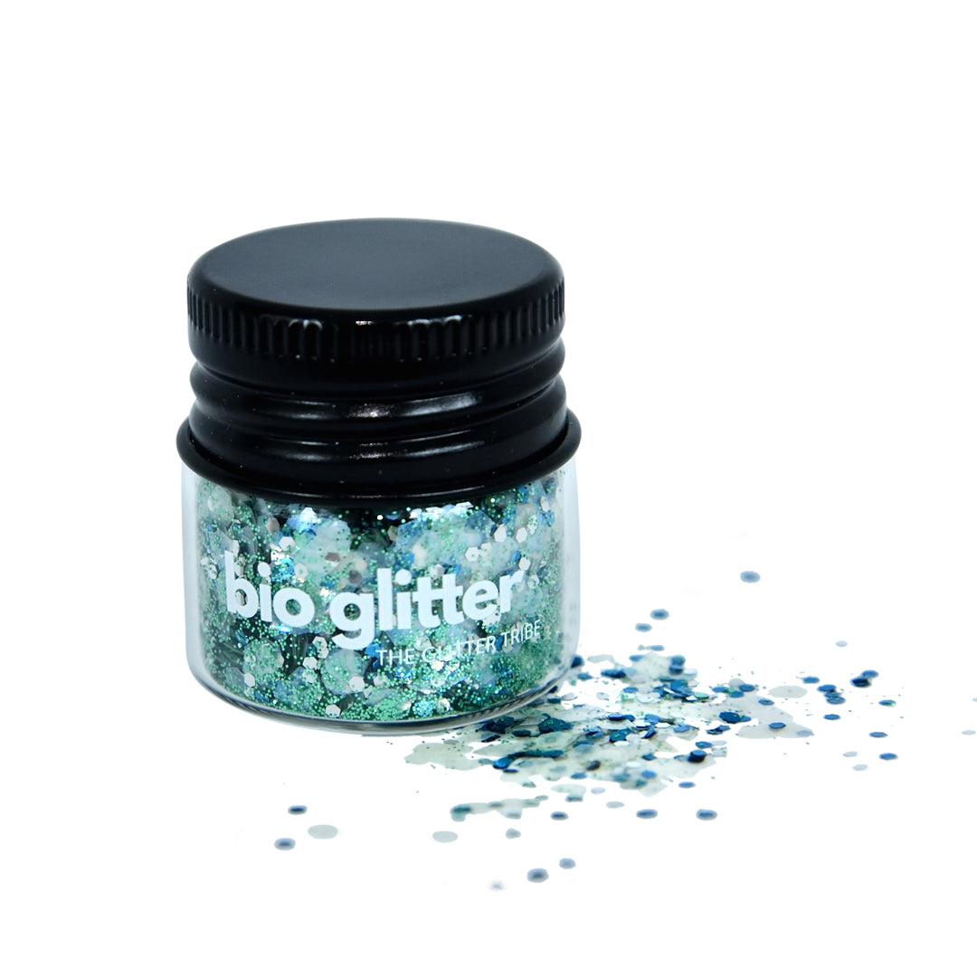 A jar of mermaid bio glitter made from plants with a black lid 